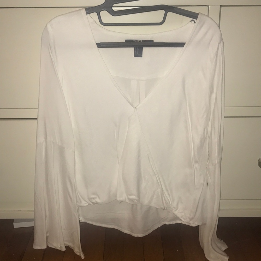 New cross front, bell sleeve blouse